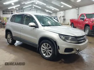 2014 Volkswagen Tiguan SEL with VIN WVGBV3AX3EW541423, listed as a IAAI auction lot 42329910 with 143,677 mi miles and . Bid and sale history available at DreamBid. Image 1.