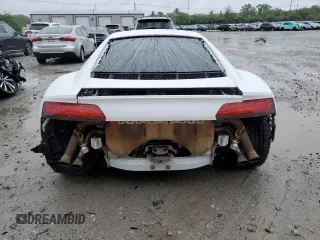 2018 Audi R8 V10 z VIN WUABAAFX5J7902445, wystawiony jako Copart lot #56587934 z przebiegiem Nie podano mil oraz Szkody całkowita. Historia ofert i sprzedaży dostępna na DreamBid. Obrazek 6.