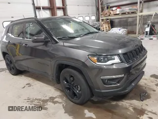 2020 Jeep Compass Latitude w/Sun/Safety Pkg with VIN 3C4NJCBB9LT257460, listed as a IAAI auction lot 41276767 with 76,744 mi miles. Bid and sale history available at carsss.com. Image 1.
