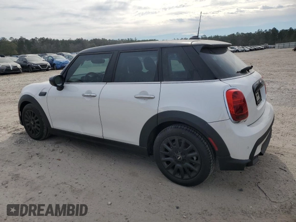 2024 MINI Hardtop 4 Door Cooper Classic with VIN WMW33DK00R2U88843, listed as a Copart auction lot 82409674 with 6,701 mi miles and Salvage Title. Bid and sale history available at DreamBid. Image 2.