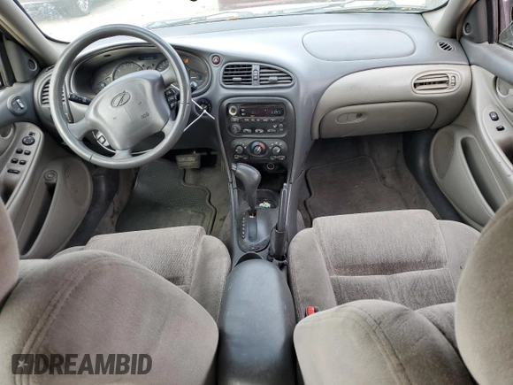 2003 Oldsmobile Alero GL1 z VIN 1G3NL52E83C168023, wystawiony jako Copart lot #76242984 z przebiegiem 154 718 mil mil oraz Szkoda całkowita • Salvage title. Historia ofert i sprzedaży dostępna na DreamBid. Obrazek 8.