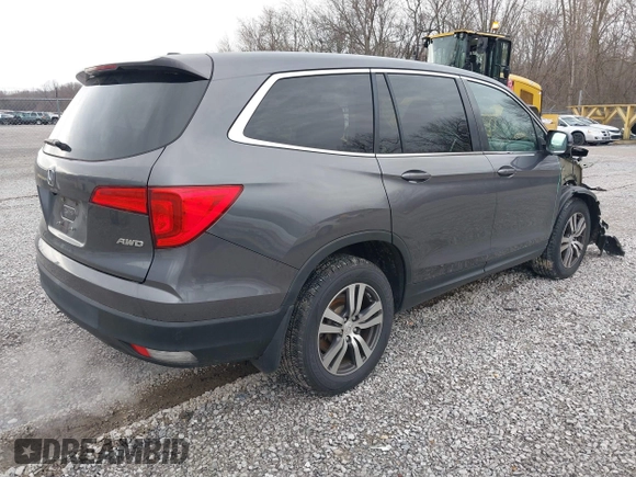 2017 Honda Pilot EX-L with VIN 5FNYF6H59HB029160, listed as a IAAI auction lot 41557192 with 157,153 mi miles and . Bid and sale history available at DreamBid. Image 4.