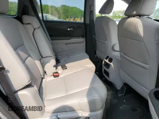 2020 Honda Pilot EX-L z VIN 5FNYF6H5XLB008097, wystawiony jako Copart lot #59329285 z przebiegiem Nie podano mil oraz Szkoda całkowita • Salvage title. Historia ofert i sprzedaży dostępna na DreamBid. Obrazek 11.