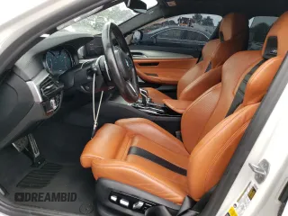 2019 BMW M5 Competition z VIN WBSJF0C54KB447781, wystawiony jako Copart lot #63513033 z przebiegiem 27 417 mil mil oraz Szkoda całkowita • Salvage title. Historia ofert i sprzedaży dostępna na DreamBid. Obrazek 7.