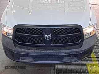 2021 Ram 1500 Tradesman with VIN 3C6JR6DG4MG640256, listed as a IAAI auction lot 42888446 with 100,569 mi miles and . Bid and sale history available at DreamBid. Image 1.