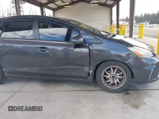 2014 Toyota Prius Two z VIN JTDZN3EU1EJ000354, wystawiony jako IAAI lot #42236443 z przebiegiem 300 021 mil mil oraz . Historia ofert i sprzedaży dostępna na DreamBid. Obrazek 6.