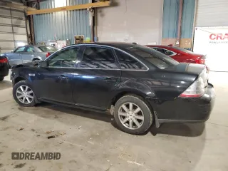 2009 Ford Taurus SEL with VIN 1FAHP27W99G102850, listed as a Copart auction lot 50009975 with 184,829 mi miles and Salvage Title. Bid and sale history available at carsss.com. Image 2.