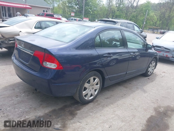 2010 Honda Civic LX with VIN 2HGFA1F52AH570385, listed as a IAAI auction lot 42234739 with 199,201 mi miles and . Bid and sale history available at DreamBid. Image 4.