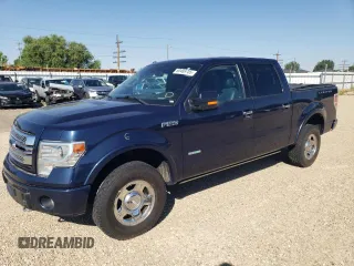 2014 Ford F-150 XL with VIN 1FTFW1ET5EFC51036, listed as a Copart auction lot 60489705 with 129,722 mi miles and Salvage title. Bid and sale history available at DreamBid. Image 1.