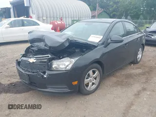 2014 Chevrolet Cruze 1LT z VIN 1G1PC5SB1E7136307, wystawiony jako IAAI lot #42544810 z przebiegiem 113 073 mil mil oraz . Historia ofert i sprzedaży dostępna na DreamBid. Obrazek 18.