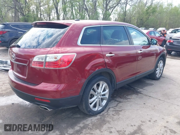 2011 Mazda CX-9 Grand Touring z VIN JM3TB2DA6B0310296, wystawiony jako IAAI lot #42022744 z przebiegiem 163 889 mil mil oraz . Historia ofert i sprzedaży dostępna na DreamBid. Obrazek 4.