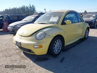 2005 Volkswagen New Beetle Coupe GLS with VIN 3VWCK31C25M404842, listed as a IAAI auction lot 41449439 with 117,428 mi miles. Bid and sale history available at carsss.com. Image 2.