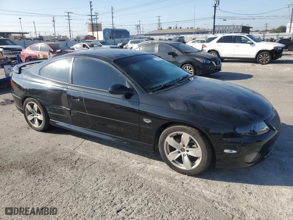 2004 Pontiac GTO with VIN 6G2VX12G44L192424, listed as a Copart auction lot 73253054 with 62,014 mi miles and Salvage Title. Bid and sale history available at carsss.com. Image 4.
