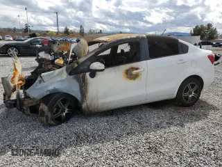 2014 Kia Rio LX with VIN KNADM4A34E6343790, listed as a Copart auction lot 46952313 with Not Provided miles and Non Repairable. Bid and sale history available at DreamBid. Image 1.