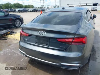 2022 Audi A5 Sportback S line Premium Plus z VIN WAUFACF5XNA009427, wystawiony jako IAAI lot #40203616 z przebiegiem 54 005 mil mil oraz . Historia ofert i sprzedaży dostępna na DreamBid. Obrazek 16.