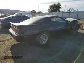 1989 Pontiac Firebird z VIN 1G2FS2186KL212458, wystawiony jako Copart lot #56995025 z przebiegiem 89 851 mil mil oraz Szkoda całkowita • Salvage title. Historia ofert i sprzedaży dostępna na DreamBid. Obrazek 3.