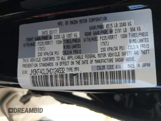 2017 Mazda CX-5 Touring with VIN JM3KFACL0H0124632, listed as a IAAI auction lot 42134971 with 107,029 mi miles and . Bid and sale history available at carsss.com. Image 9.