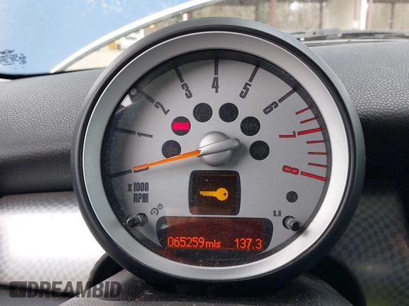 2007 MINI Hardtop S with VIN WMWMF73527TL91061, listed as a IAAI auction lot 41842104 with 65,259 mi miles and . Bid and sale history available at DreamBid. Image 7.