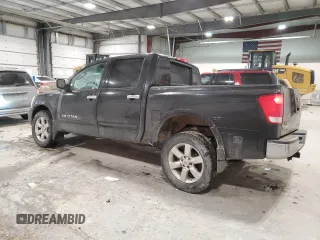 2010 Nissan Titan LE with VIN 1N6BA0EC1AN320311, listed as a Copart auction lot 85157484 with 234,050 mi miles and Salvage Title. Bid and sale history available at carsss.com. Image 2.