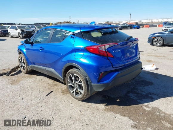 2021 Toyota C-HR LE with VIN JTNKHMBX0M1118192, listed as a IAAI auction lot 41805188 with 67,101 mi miles and . Bid and sale history available at DreamBid. Image 3.