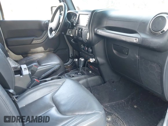 2016 Jeep Wrangler Unlimited Sport with VIN 1C4BJWDG2GL281985, listed as a IAAI auction lot 40518617 with 105,415 mi miles and . Bid and sale history available at DreamBid. Image 5.