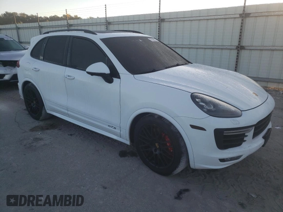 2017 Porsche Cayenne GTS with VIN WP1AD2A29HLA83277, listed as a Copart auction lot 76765974 with 47,838 mi miles and Salvage title. Bid and sale history available at DreamBid. Image 4.