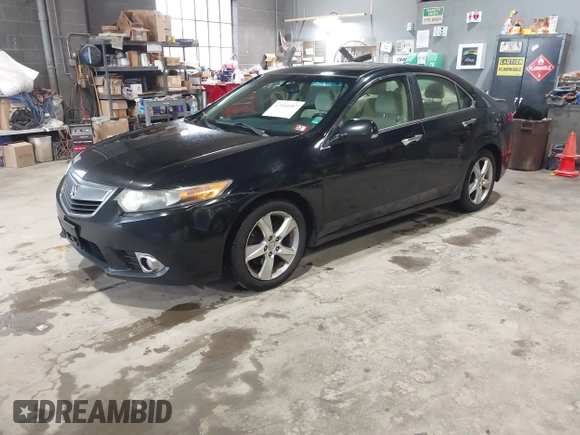 2012 Acura TSX with VIN JH4CU2F49CC010017, listed as a IAAI auction lot 42144097 with 217,581 mi miles and . Bid and sale history available at DreamBid. Image 2.