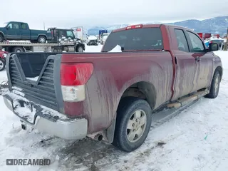 2010 Toyota Tundra 4WD Truck with VIN 5TFUW5F17AX096876, listed as a IAAI auction lot 41583521 with 118,084 mi miles. Bid and sale history available at carsss.com. Image 4.
