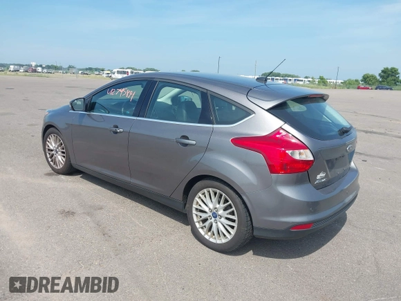 2014 Ford Focus Titanium with VIN 1FADP3N26EL453107, listed as a IAAI auction lot 42745891 with 148,743 mi miles and . Bid and sale history available at DreamBid. Image 3.