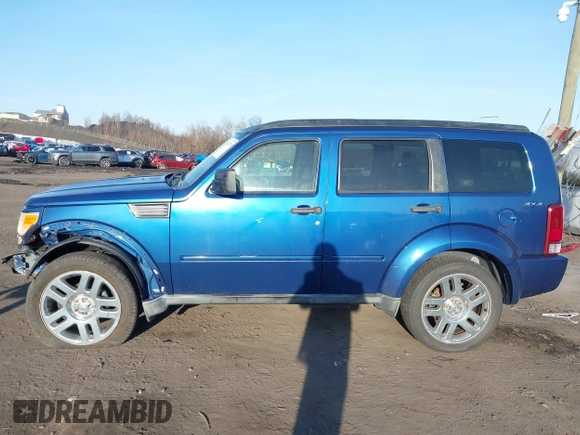 2010 Dodge Nitro Heat z VIN 1D4PU4GK1AW157684, wystawiony jako IAAI lot #41767719 z przebiegiem 140 260 mil mil oraz . Historia ofert i sprzedaży dostępna na DreamBid. Obrazek 13.
