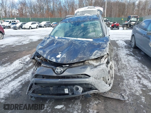2017 Toyota RAV4 LE with VIN JTMZFREV9HJ119332, listed as a IAAI auction lot 41257790 with 94,992 mi miles and . Bid and sale history available at carsss.com. Image 12.