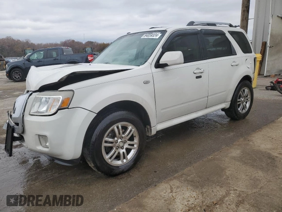 2009 Mercury Mariner Premier with VIN 4M2CU87G79KJ03236, listed as a Copart auction lot 84059324 with 130,335 mi miles and Salvage title. Bid and sale history available at DreamBid. Image 1.
