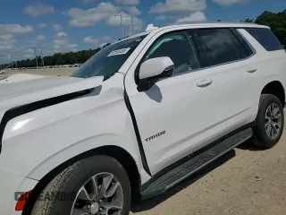 2021 Chevrolet Tahoe LT z VIN 1GNSCNKD1MR130424, wystawiony jako Copart lot #62596485 z przebiegiem 106 648 mil mil oraz Szkoda całkowita • Salvage title. Historia ofert i sprzedaży dostępna na DreamBid. Obrazek 14.