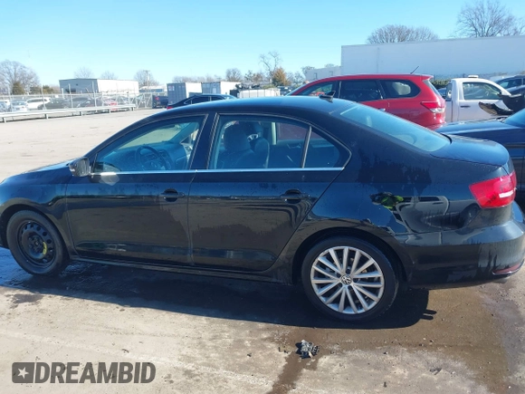 2015 Volkswagen Jetta Sedan 1.8T SE w/Connectivity with VIN 3VWD07AJ6FM303403, listed as a IAAI auction lot 41330778 with 150,949 mi miles. Bid and sale history available at carsss.com. Image 14.