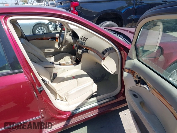 2005 Mercedes-Benz E-Class 3.2L with VIN WDBUF65J15A637760, listed as a IAAI auction lot 41842173 with 97,439 mi miles. Bid and sale history available at carsss.com. Image 5.