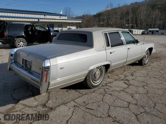 1990 Cadillac Brougham z VIN 1G6DW5476LR721785, wystawiony jako Copart lot #47170405 z przebiegiem Nie podano mil oraz Szkody całkowita. Historia ofert i sprzedaży dostępna na DreamBid. Obrazek 3.