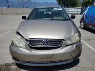 2005 Toyota Corolla CE with VIN 1NXBR32E65Z435061, listed as a Copart auction lot 55148175 with 58,673 mi miles and Salvage Title. Bid and sale history available at DreamBid. Image 5.