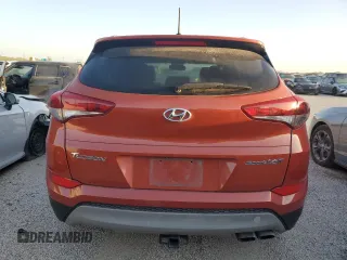 2017 Hyundai Tucson Sport z VIN KM8J33A25HU356909, wystawiony jako Copart lot #52573445 z przebiegiem 164 029 mil mil oraz Szkoda całkowita • Salvage title. Historia ofert i sprzedaży dostępna na DreamBid. Obrazek 6.