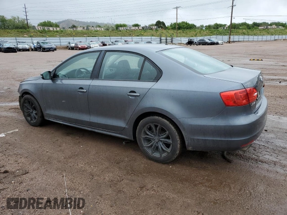 2012 Volkswagen Jetta SE z VIN 3VWDX7AJ7CM124472, wystawiony jako Copart lot #58871595 z przebiegiem 143 563 mil mil oraz Czysty tytuł • Clean title. Historia ofert i sprzedaży dostępna na DreamBid. Obrazek 2.