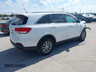 2018 Kia Sorento LX with VIN 5XYPG4A50JG350705, listed as a IAAI auction lot 41537305 with 82,346 mi miles and . Bid and sale history available at DreamBid. Image 4.