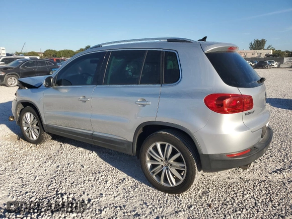 2014 Volkswagen Tiguan SE z VIN WVGAV3AX6EW549608, wystawiony jako Copart lot #48240405 z przebiegiem 81 629 mil mil oraz Szkoda całkowita • Salvage title. Historia ofert i sprzedaży dostępna na DreamBid. Obrazek 2.