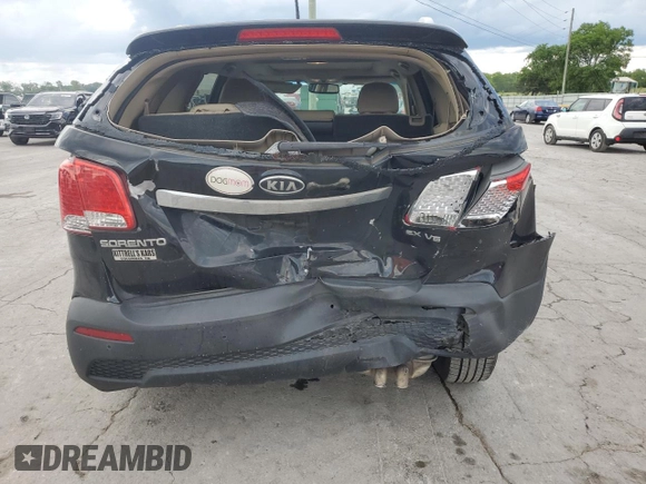 2012 Kia Sorento EX z VIN 5XYKU4A26CG252144, wystawiony jako Copart lot #56290995 z przebiegiem 220 802 mil mil oraz Szkoda całkowita • Salvage title. Historia ofert i sprzedaży dostępna na DreamBid. Obrazek 6.