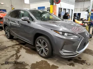 2022 Lexus RX with VIN 2T2HZMDA2NC323851, listed as a Copart auction lot 70025382 with 26,613 mi miles. Bid and sale history available at carsss.com. Image 4.