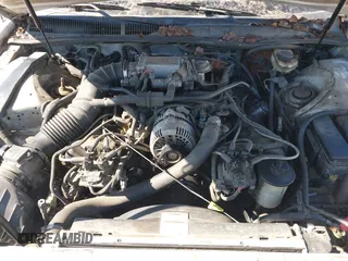 1996 Ford Thunderbird LX with VIN 1FALP62W3TH135238, listed as a IAAI auction lot 41692746 with 136,464 mi miles and . Bid and sale history available at DreamBid. Image 10.