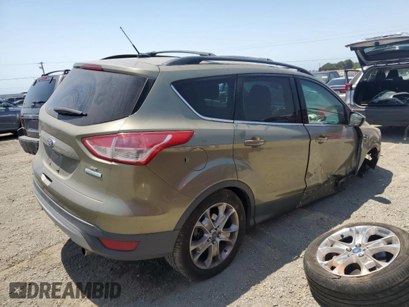 2013 Ford Escape SE with VIN 1FMCU0GX4DUB91663, listed as a Copart auction lot 59167195 with 115,081 mi miles and Salvage title. Bid and sale history available at DreamBid. Image 3.