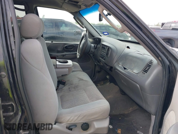 2003 Ford F-150 XLT with VIN 1FTRW07623KB30354, listed as a IAAI auction lot 41960766 with 366,800 mi miles. Bid and sale history available at carsss.com. Image 5.