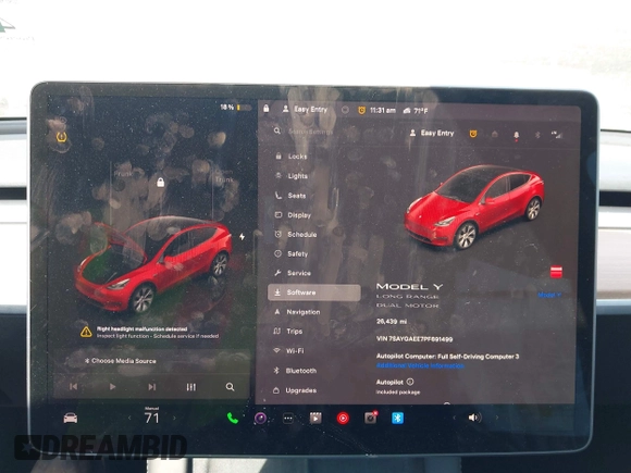 2023 Tesla Model Y Long Range z VIN 7SAYGAEE7PF691499, wystawiony jako IAAI lot #42038850 z przebiegiem 26 439 mil mil oraz . Historia ofert i sprzedaży dostępna na DreamBid. Obrazek 7.