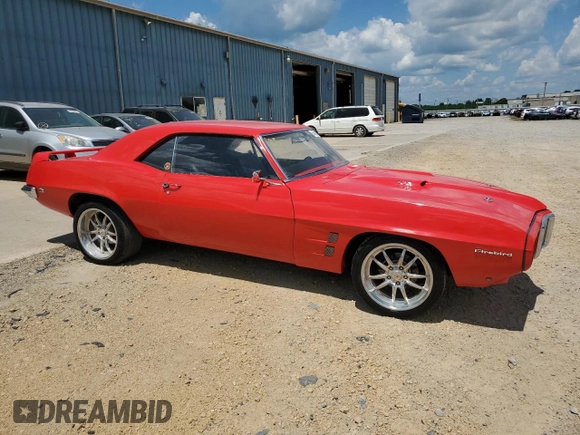 1969 Pontiac Firebird with VIN 223379U116573, listed as a Copart auction lot 64091015 with 142 mi miles and Clean title. Bid and sale history available at DreamBid. Image 4.