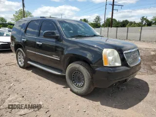 2011 GMC Yukon Denali z VIN 1GKS2EEF2BR308951, wystawiony jako Copart lot #57052825 z przebiegiem 217 895 mil mil oraz Tytuł czysty. Historia ofert i sprzedaży dostępna na DreamBid. Obrazek 4.