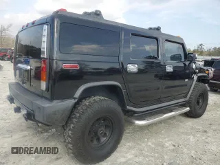 2004 Hummer H2 with VIN 5GRGN23U54H118187, listed as a Copart auction lot 76258264 with 169,531 mi miles and Salvage Title. Bid and sale history available at carsss.com. Image 3.